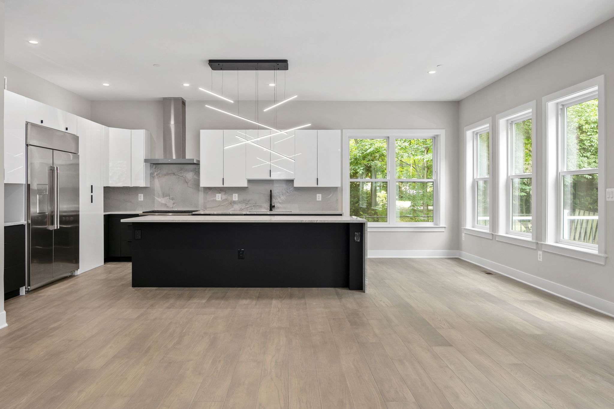 Open-concept living and dining area in an Energy-Efficient Green Home 