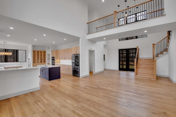 Custom LEED Gold-Certified Smart Home open floorplan living room and kitchen area