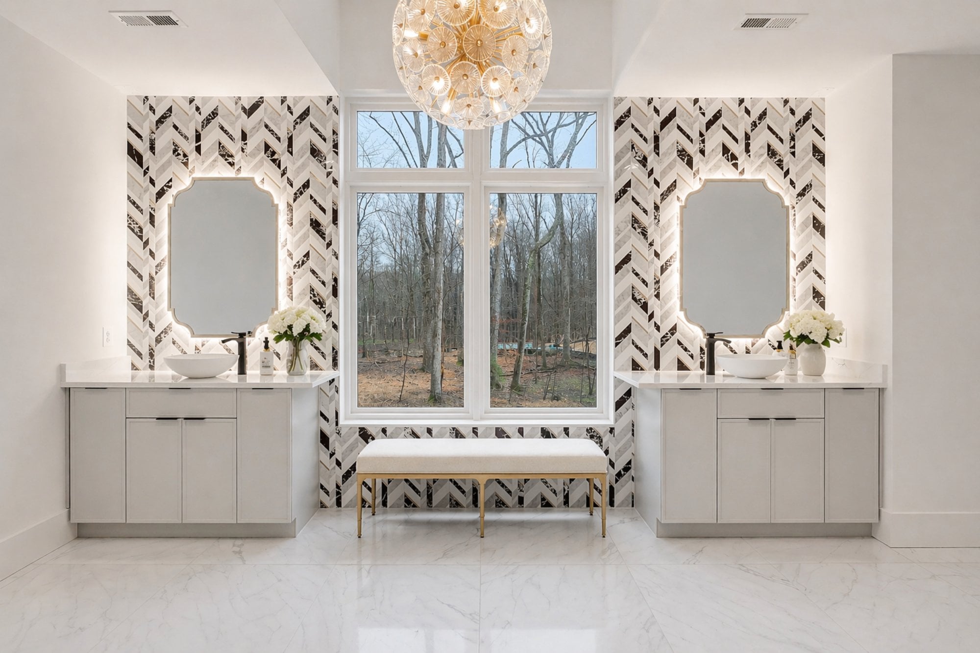 great falls primary bath by august homes luxury bathroom with dual vanities patterned tile walls and large window view
